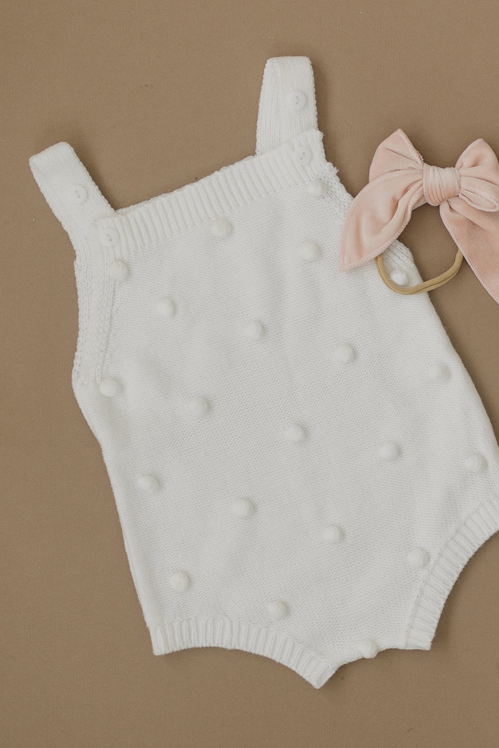 Baby romper and headband.