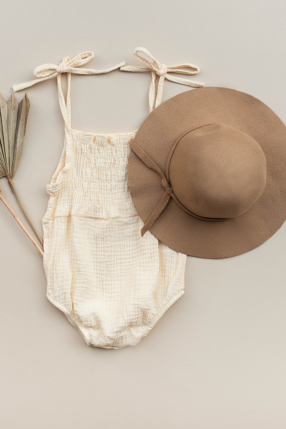 Baby romper and hat set.