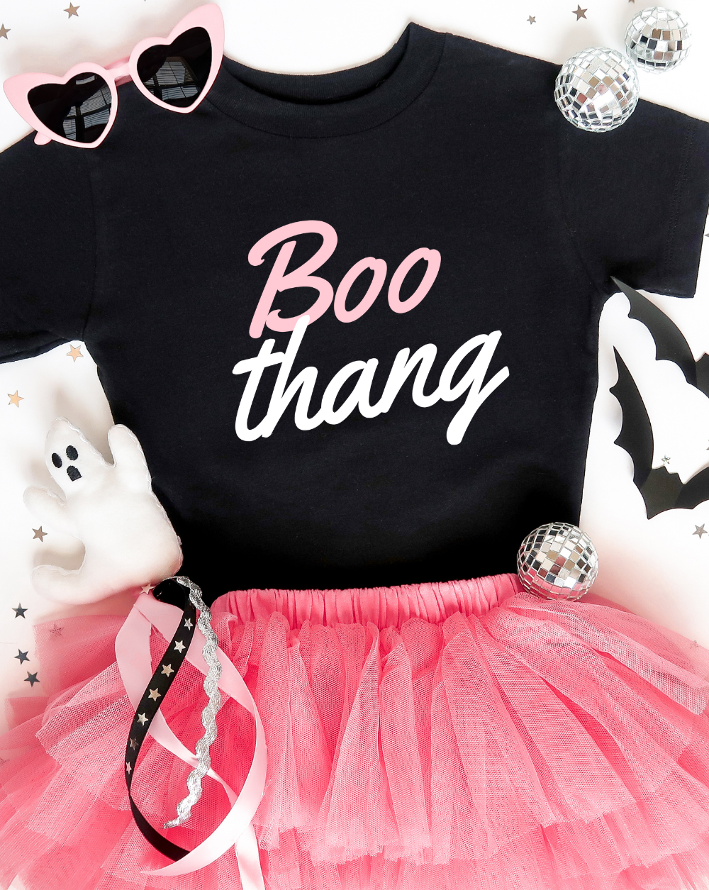 Retro Halloween Shirt for baby, pastel pink and white writing that says Boo Thang