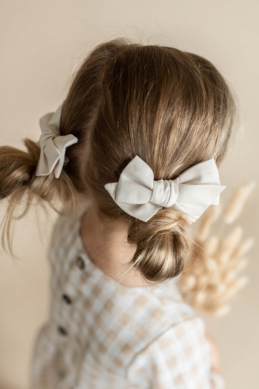 Pigtail hair bows made in Canada.