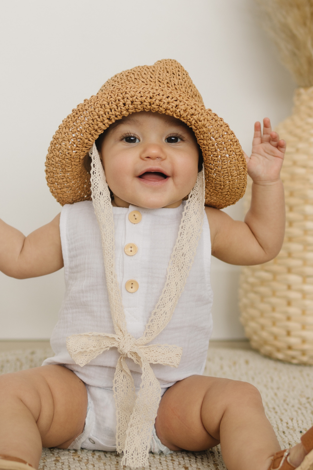 Baby romper and hat set.